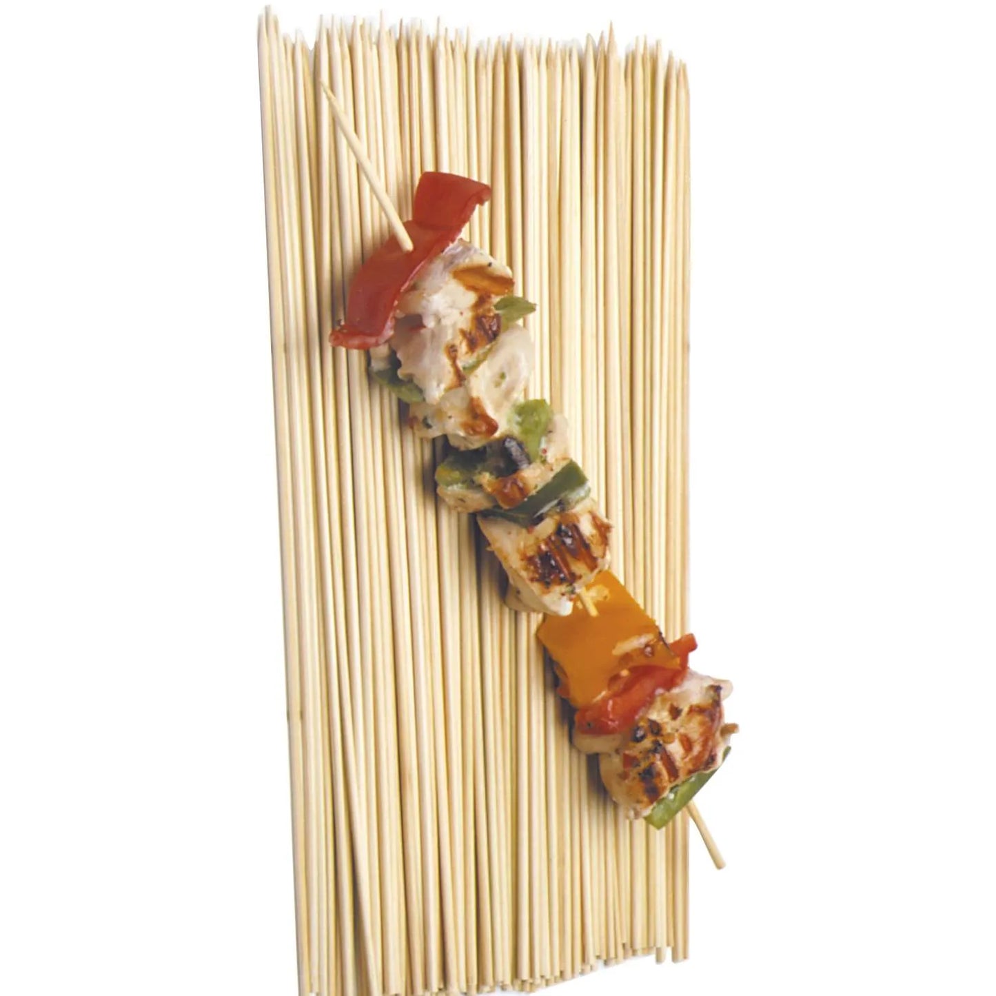 Grilled chicken and vegetable kabob on a single bamboo skewer laid over a group of skewers.