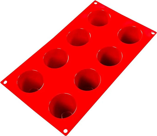 Fat Daddio's Silicone 8-Cavity Baking Mold in red, featuring eight deep round cavities. Made from food-grade silicone, flexible, non-stick, and temperature-safe from -40°F to 550°F.