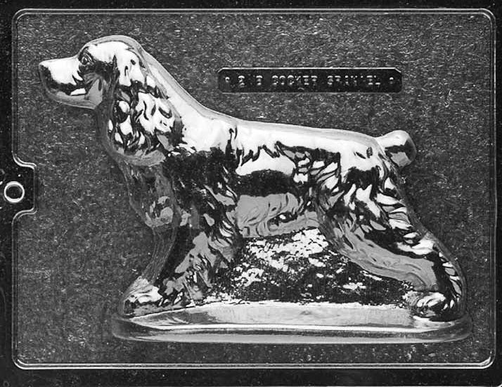 Clear plastic chocolate mold showing the matching back half of a Cocker Spaniel with continued ear and coat contours, designed to pair with the front half for a complete 3D chocolate dog.