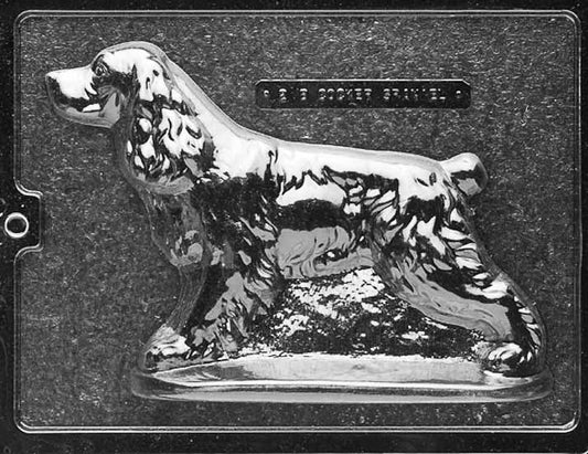 Clear plastic chocolate mold showing the matching back half of a Cocker Spaniel with continued ear and coat contours, designed to pair with the front half for a complete 3D chocolate dog.