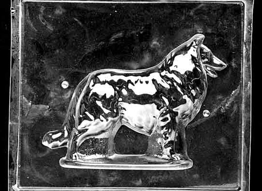 Clear plastic chocolate mold showing the matching back half of a Collie with fluffy haunch and tail detailing, designed to pair with the front half for a complete 3D chocolate dog.