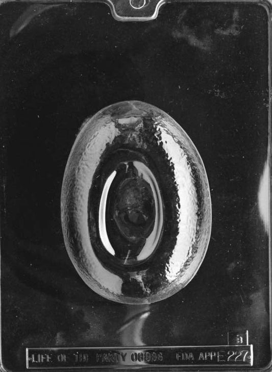 Clear plastic chocolate mold showing the back half of an egg-shaped cavity with a smooth oval center and lightly textured surface, designed to pair with the bunny scene front.