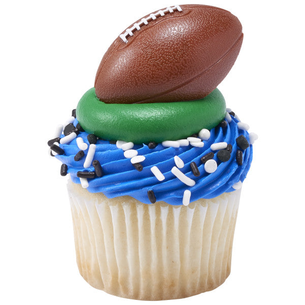 Cupcake with blue and green frosting topped with a 3D football ring.