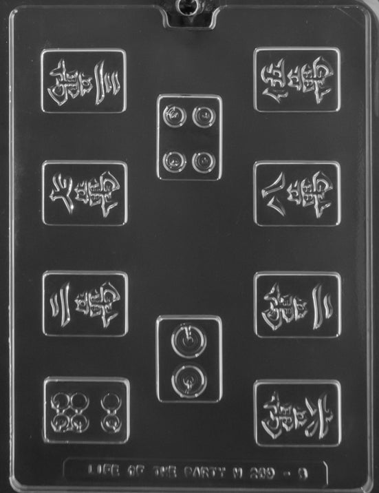 Clear plastic chocolate mold sheet with Mahjong tile-shaped cavities featuring embossed symbol-style designs and dot patterns, sized for bite-sized chocolates.