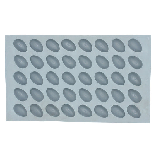 Full sheet of 40 small egg-shaped cavities in a natural rubber mold used for creating spring or holiday-themed treats like mints or chocolates.