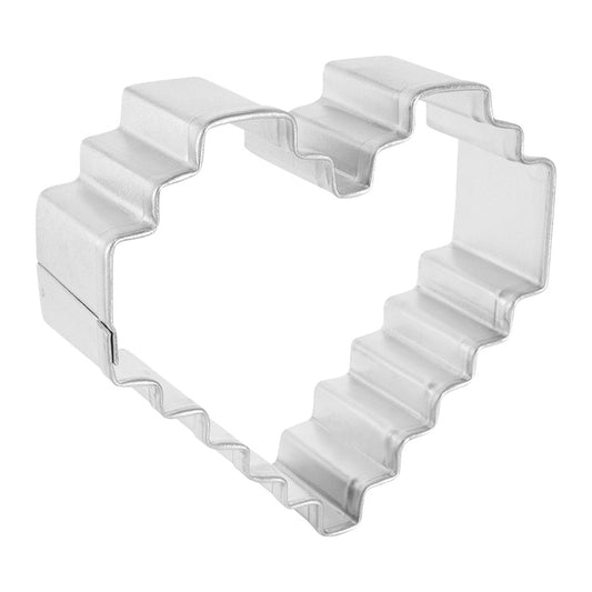 Side view of an 8-bit pixelated heart-shaped cookie cutter made of metal, showcasing its sturdy construction and distinctive pixelated edges.
