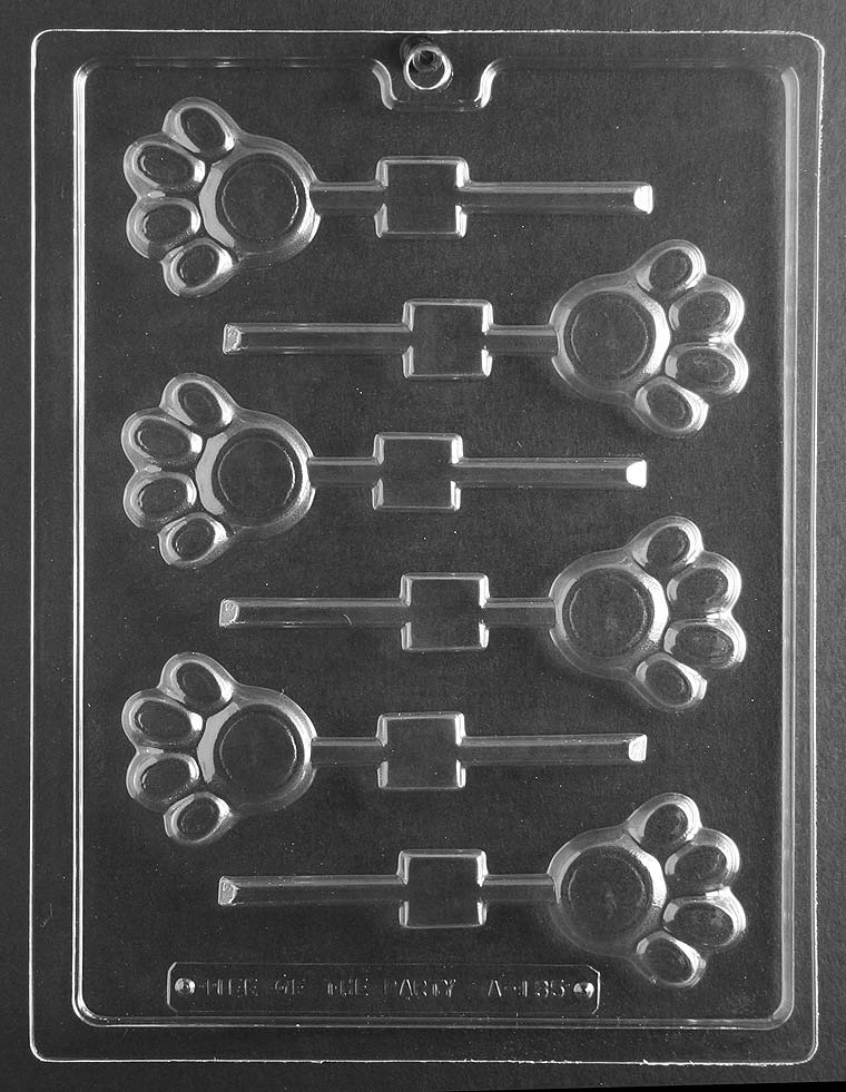 Lollipop cavities shaped like bold paw prints with rounded pads; shallow thickness.