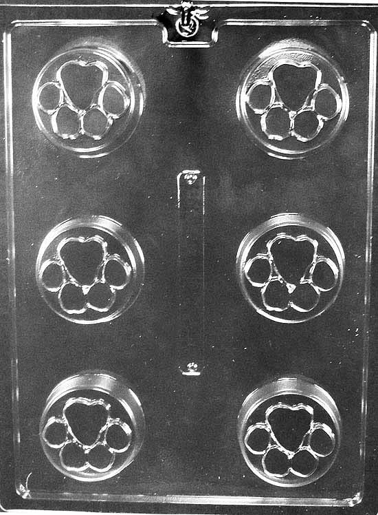 Round cavity with recessed paw print pads; thicker profile suited to cookie-style candies.