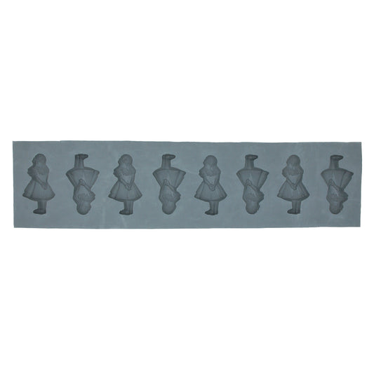 Full sheet of Alice in Wonderland rubber mint molds with seven cavities featuring the same standing girl design. Perfect for creating storybook-themed mints or chocolates.