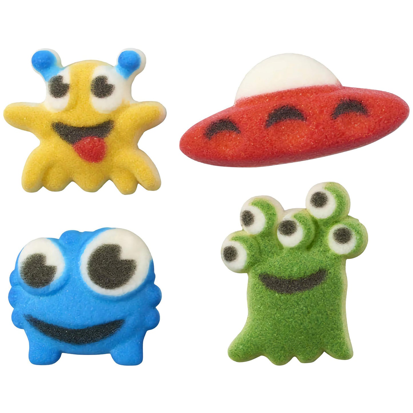 Colorful pressed sugar decorations featuring whimsical alien characters: a yellow star-like alien with a red tongue, a red UFO, a blue happy alien face, and a green alien with multiple eyes.
