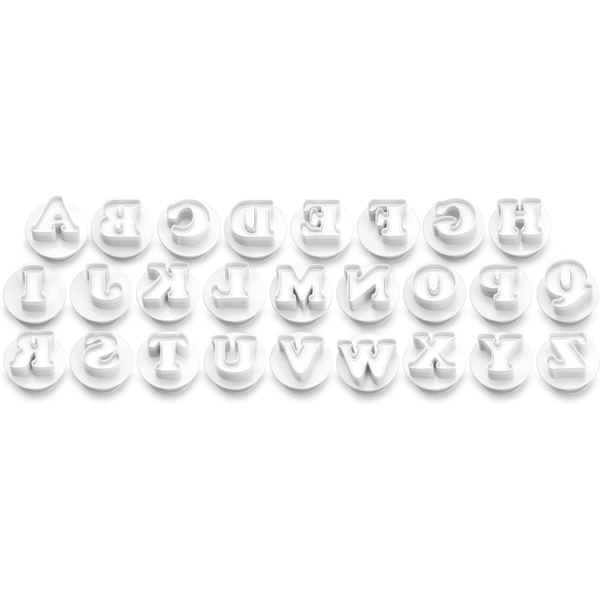 Ateco plastic alphabet plunger cutter set, featuring 26 white cutters with embossed capital letters, neatly arranged in a row.