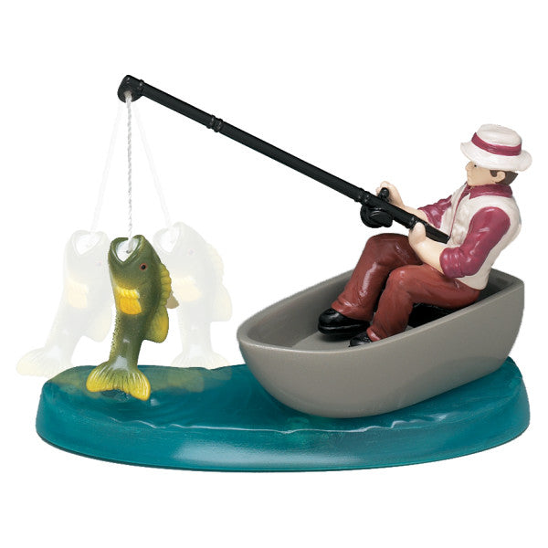 Fishing cake topper showing a fisherman in a gray boat catching a large green fish
