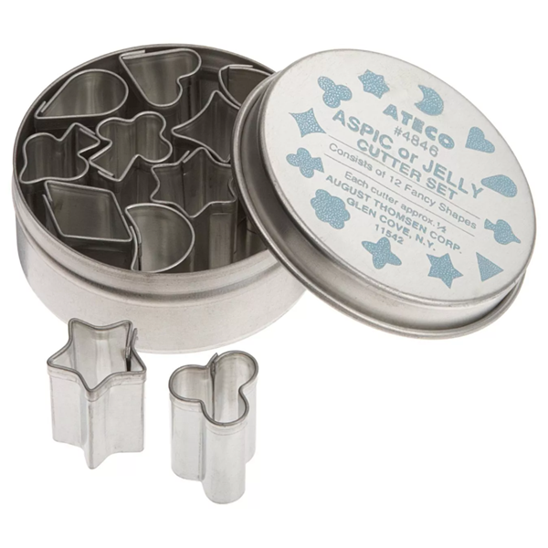 Set of 12 tin aspic and jelly cutters in assorted shapes, stored in a classic tin container. Ideal for creating decorative garnishes, fondant shapes, and small cookies.