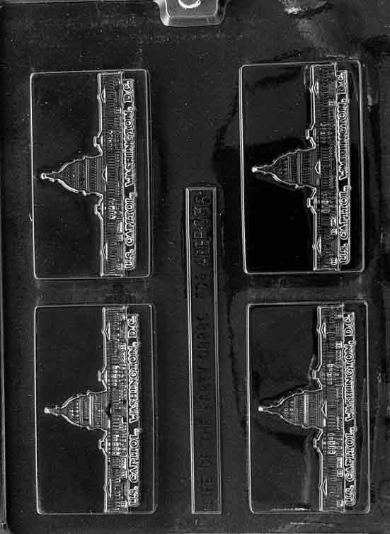 Clear business-card chocolate mold reading “WASHINGTON D.C.”; rectangular plaque; smooth framed edge.