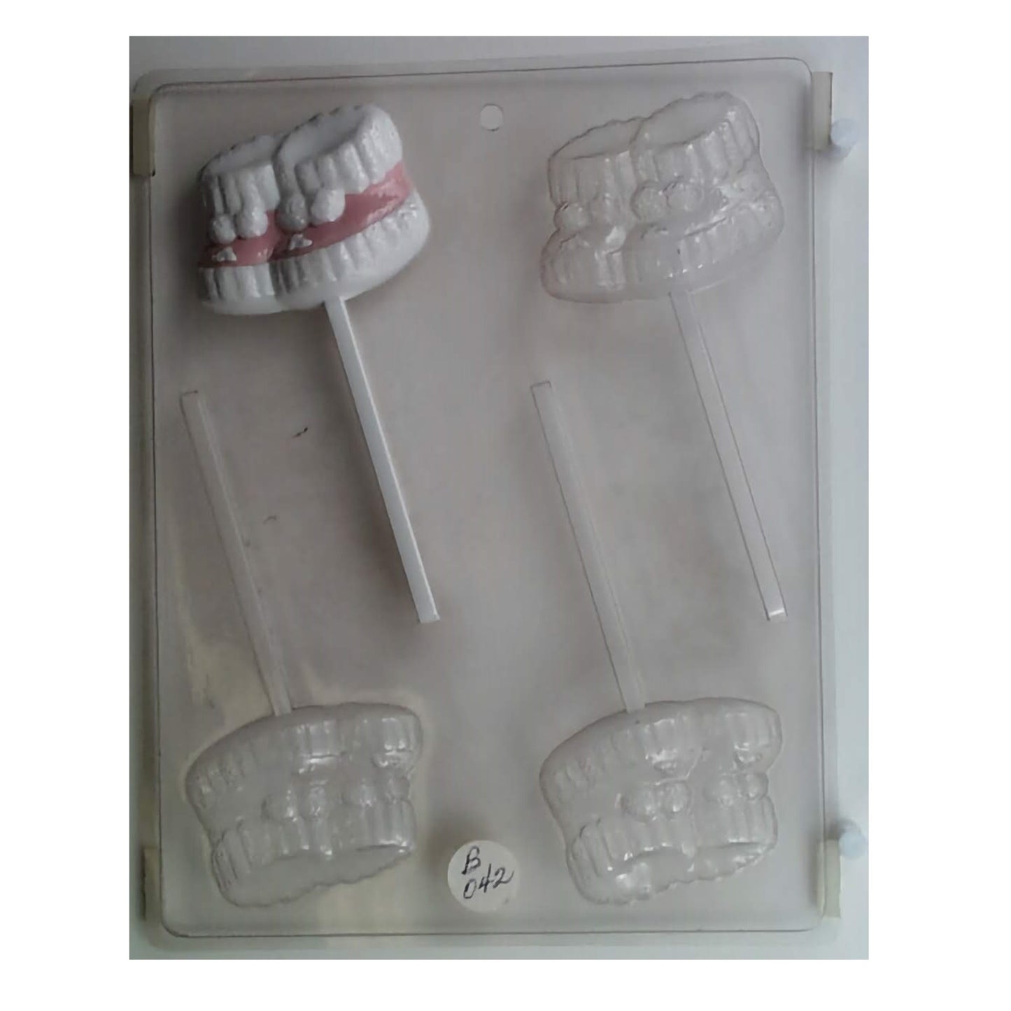 Adorable baby booties sucker mold with intricate details, perfect for baby shower chocolate lollipops or edible decorations.
