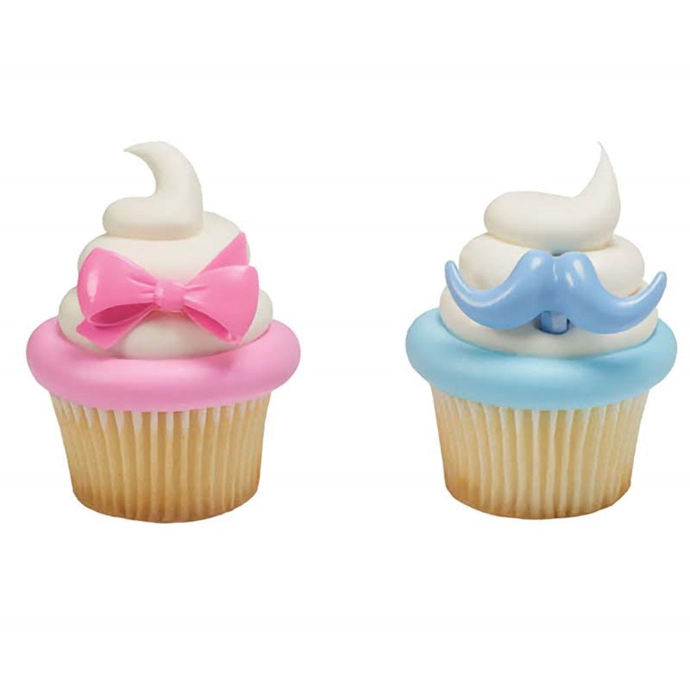 Baby cupcake toppers with pink bows and blue mustaches, ideal for gender reveal parties and baby shower cupcakes.