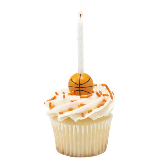 Vanilla cupcake topped with orange sprinkles, basketball candle holder, and white spiral birthday candle