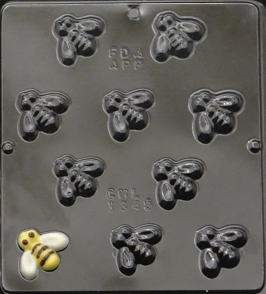 Clear plastic chocolate mold with ten small bee-shaped cavities arranged in a grid; each cavity shows rounded body, striped abdomen, and two oval wings; sheet roughly 8 x 9 inches with bees about 1.5 inches across; bee chocolate mold for candies and party favors.