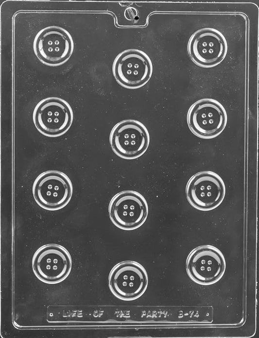 Clear multi-cavity chocolate mold featuring small round button shapes with a raised rim and four stitch holes, arranged in rows on a glossy plastic sheet.