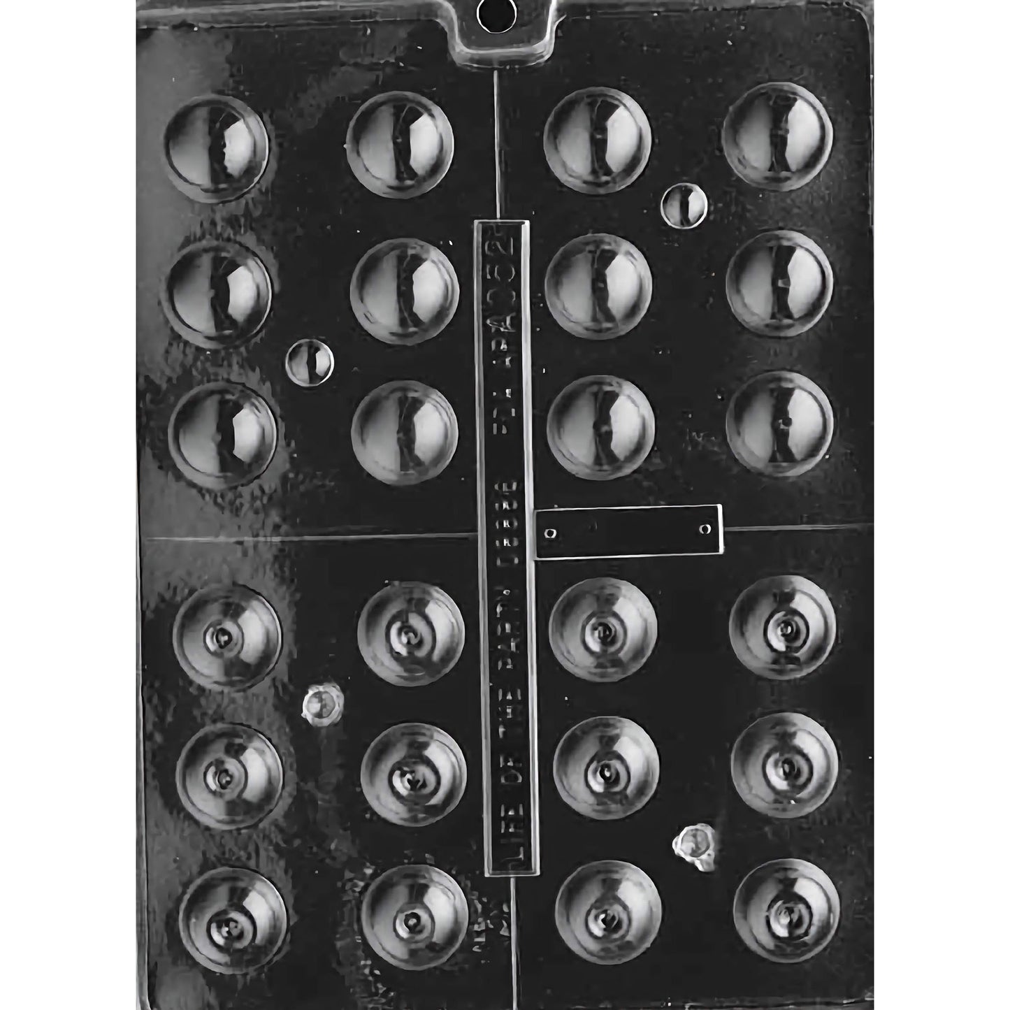 Bite-Sized Round Liquor Pieces Chocolate Mold featuring small round cavities, each 1 inch in diameter, for creating unique liquor-filled chocolates. Made of food-grade plastic and manufactured in the USA.