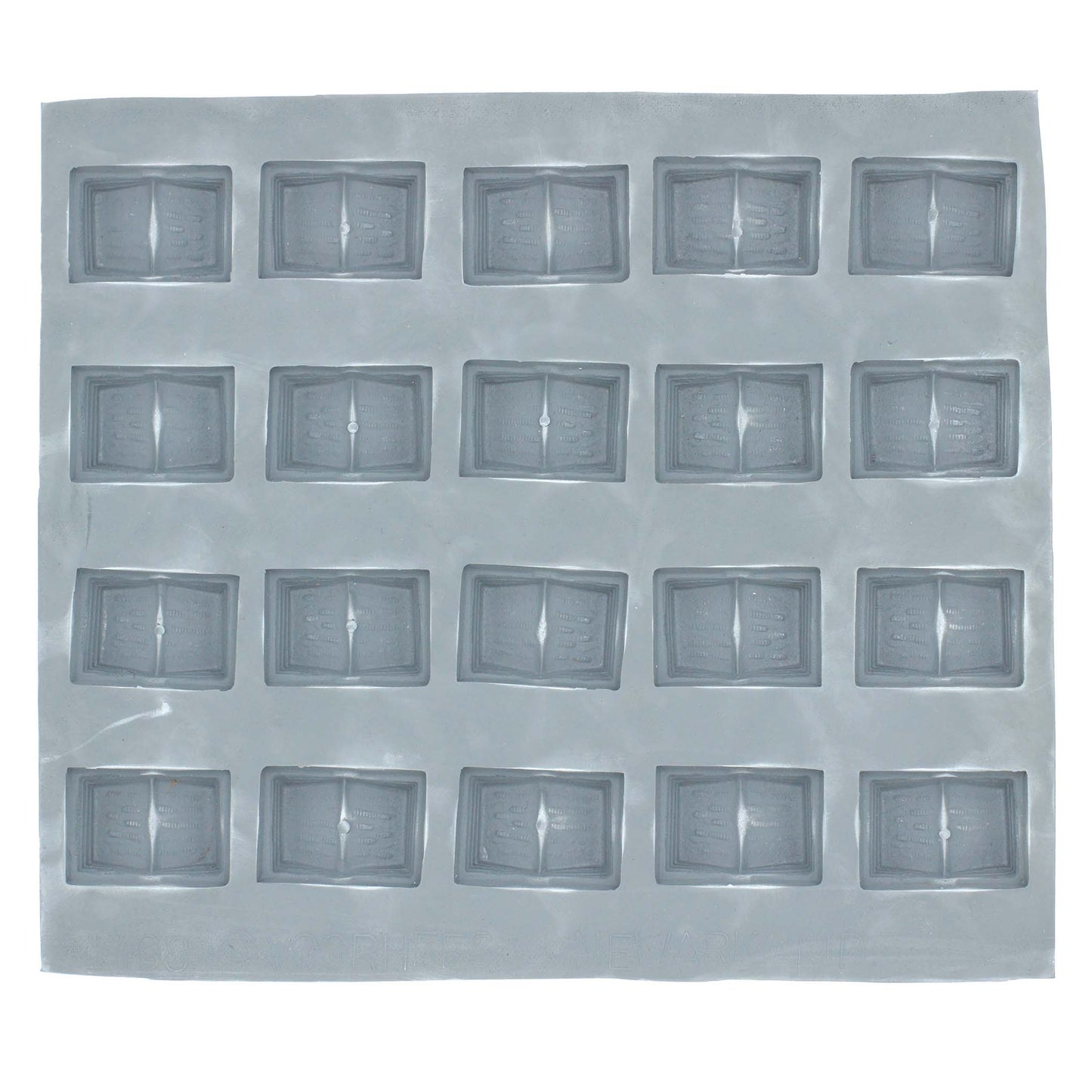 Full sheet of 24 book-shaped mint mold cavities made of lead-free natural rubber, ideal for graduation and literary-themed treats.