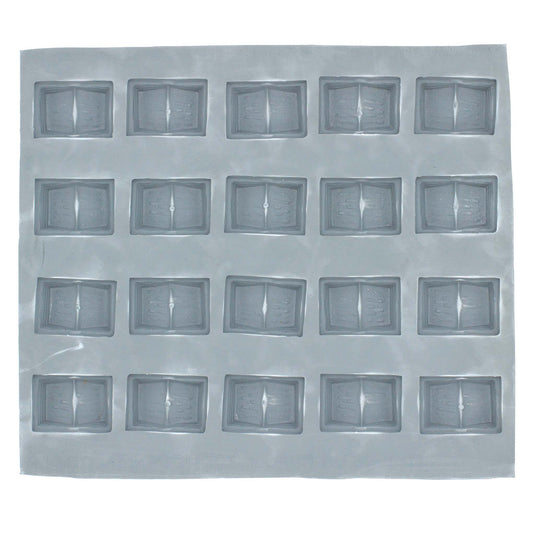 Full sheet of 24 book-shaped mint mold cavities made of lead-free natural rubber, ideal for graduation and literary-themed treats.