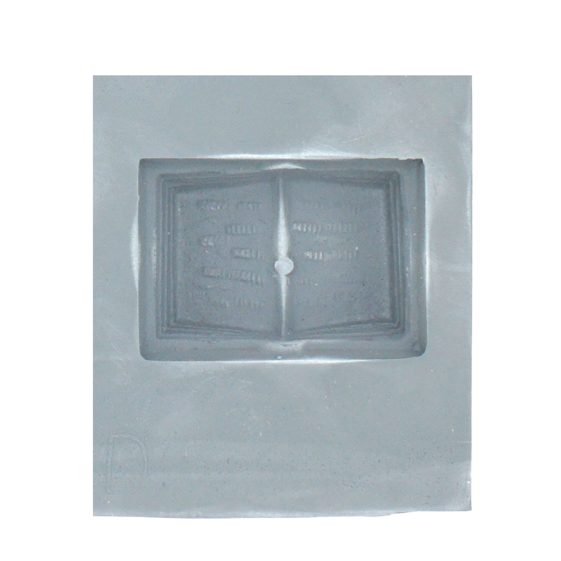 Close-up of a book-shaped cavity in a lead-free rubber mint mold, perfect for cream cheese mints, chocolates, or fondant decorations.