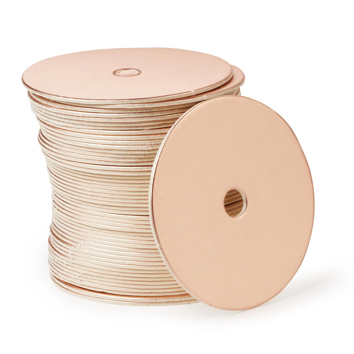 Stack of round rose gold cake pop boards with a satin finish and straight edges, each with a center hole, shown with one board facing forward.