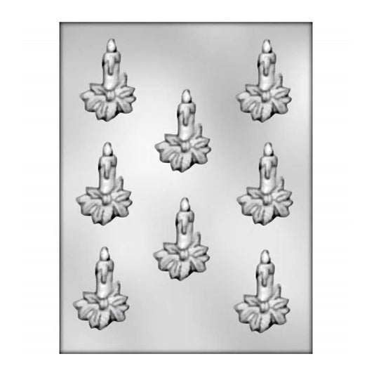 Chocolate mold featuring a candle surrounded by holly leaves, intended for creating holiday-themed chocolate decorations.
