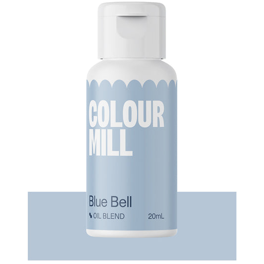 Bottle of Colour Mill Blue Bell Oil Blend food coloring with pastel blue label and white cap, 20mL size