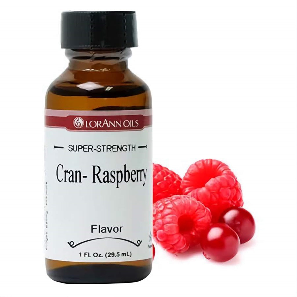 A 1 fl oz bottle of LorAnn Oils Super Strength Cran-Raspberry Flavor, with a cluster of vibrant raspberries and cranberries, reflecting the blend of tart and sweet berry notes.