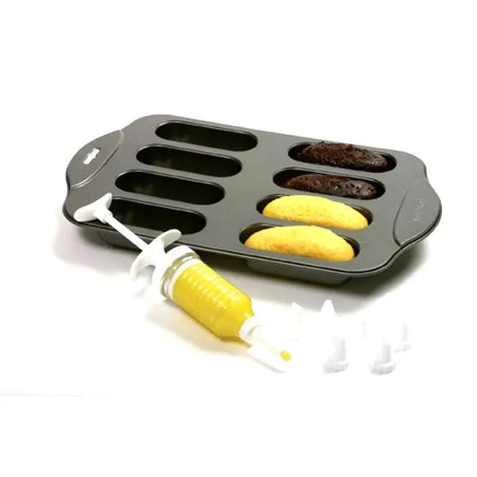 Non-stick twinkie pop pan with four baked cakes (two yellow, two chocolate) and a yellow-filled syringe with multiple nozzles.
