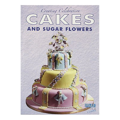 Cover of "Creating Celebration Cakes and Sugar Flowers" book featuring a multi-tiered pastel decorated cake with floral and ribbon detailing.
