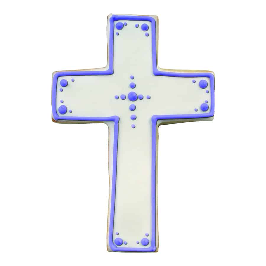 White cross-shaped cookie decorated with purple icing dots and border, perfect for religious celebrations like confirmations and baptisms.