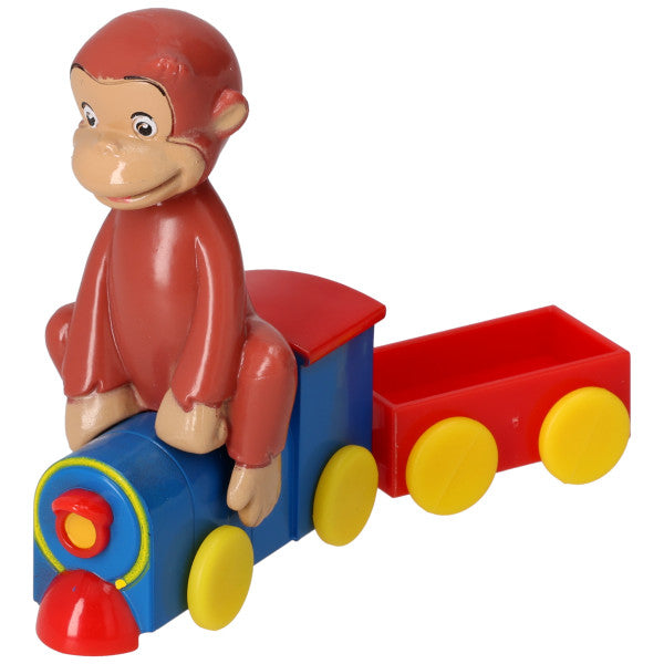 Close-up of Curious George riding the keepsake train from cake topper set