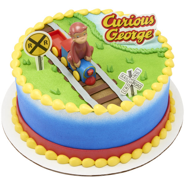 Round cake with Curious George riding a train topper and raised track design