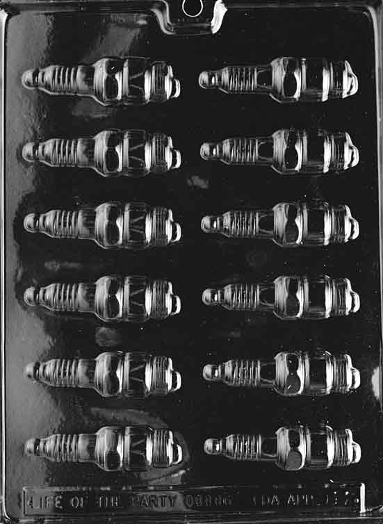 Tiny chocolate mold shaped like spark plugs