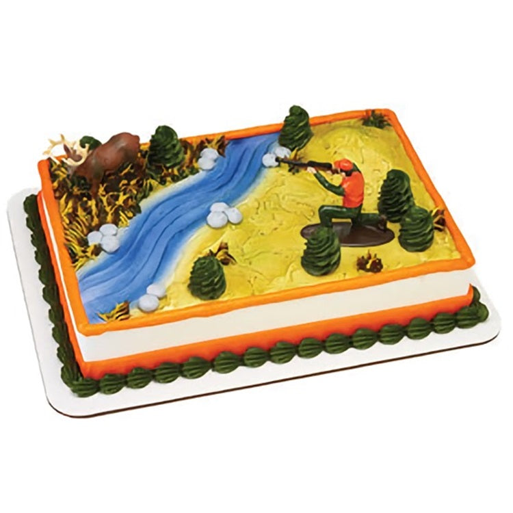 Rectangular cake topper set with a deer hunting theme, featuring a hunter in an orange jacket aiming a rifle, a majestic brown deer, blue stream details, and green trees, all atop a yellow icing base with orange and green border details. Perfect for hunting enthusiasts and themed celebrations.