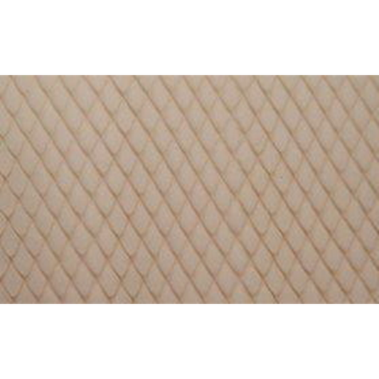 Detailed view of the diamond pattern created by the Ateco 18404 Diamond Impression Sleeve on a sheet of dough.