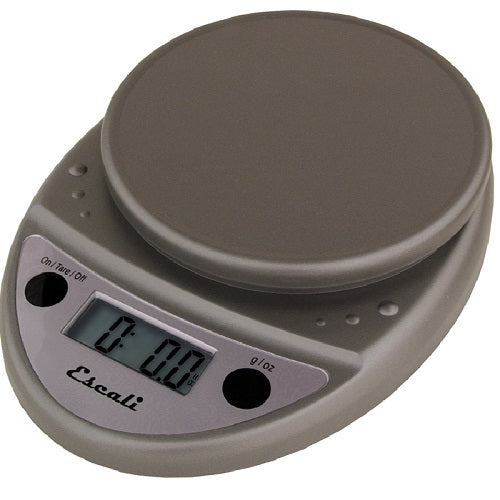 A compact metallic colored digital kitchen scale with a round removable weighing platform, a digital display, and two simple buttons for tare and unit conversion.