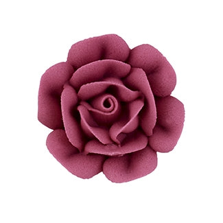 Dusty rose colored royal icing flower, piped medium-size rose for decorating desserts