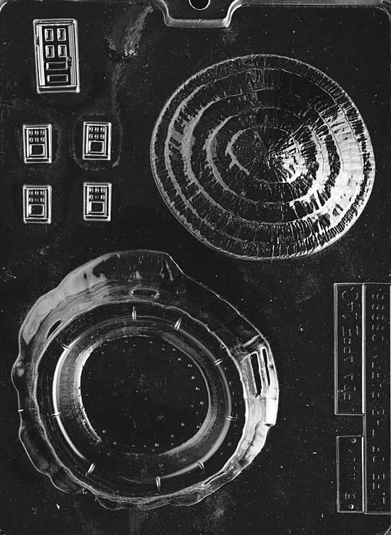 Chocolate mold shaped like a bunny hut box, designed to hold treats.