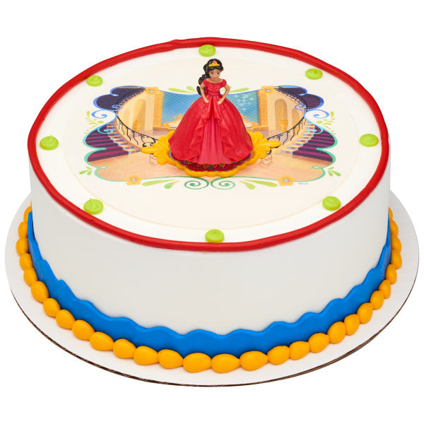 A round cake featuring Elena on a royal-themed backdrop with bold, vibrant colors.