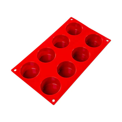 Fat Daddio's Cylinder Silicone Mold in red, featuring eight cylindrical cavities. Made from food-grade silicone, flexible, non-stick, and temperature-safe from -40°F to 550°F.
