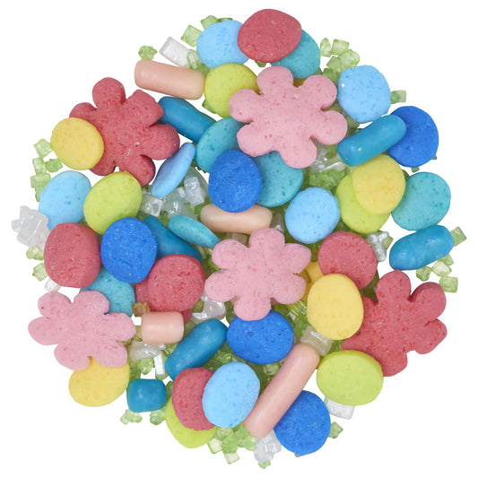 A vibrant mix of fiesta-themed sprinkles featuring multi-colored pastel candy beads, rods, and flower shapes in shades of blue, pink, green, and yellow, perfect for a festive touch on desserts.