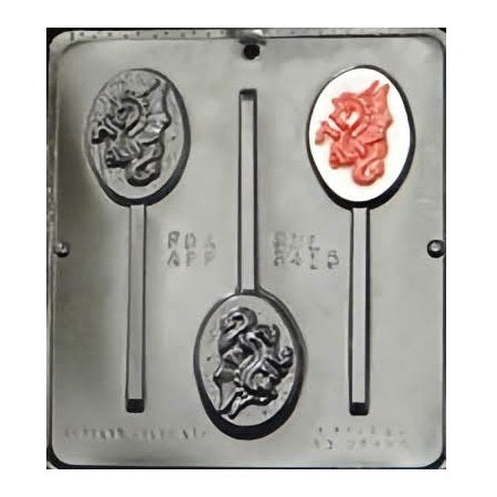 Chocolate mold for making fire dragon-shaped suckers. The mold features three cavities, each with a detailed dragon design, one of which is filled with red-colored chocolate to highlight the fiery theme. The mold includes a built-in stick holder for each cavity, ensuring the finished chocolate suckers are ready for easy handling and enjoyment.