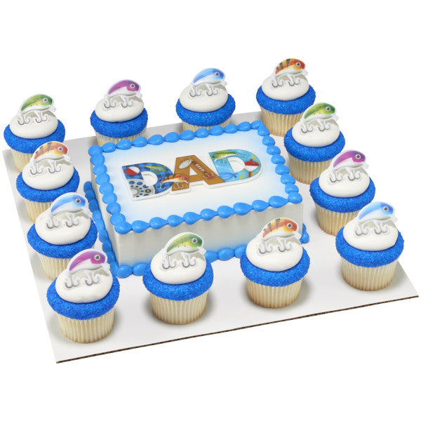 Father’s Day cake set with coordinating cupcakes, each decorated with fishing lure rings and blue accents.