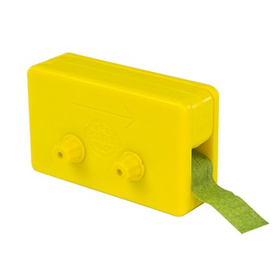 Yellow JEM Tape Cutter and Shredder tool with green florist tape being fed through, designed for sugar flower spray work and ribbon cutting.