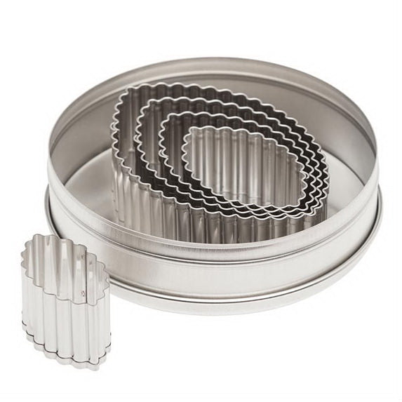 Ateco 5205 5-piece stainless steel fluted football cutter set, neatly nested in a round storage tin.