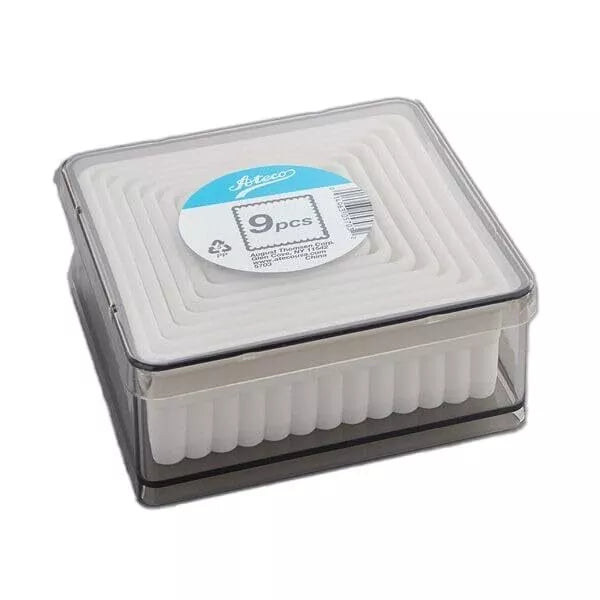 Ateco 5703 9-piece fluted square cutter set in a clear plastic storage container, showing neatly nested white plastic cutters.